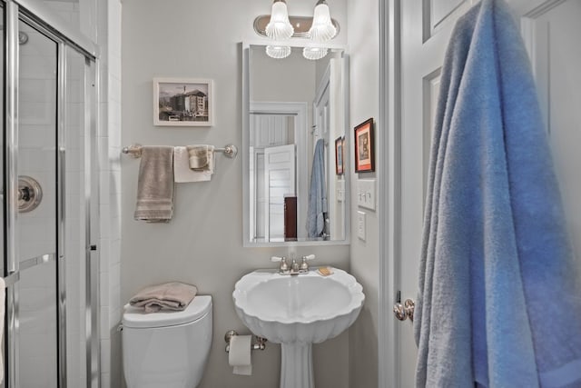 41 Legare St Unit C, Charleston, SC 29401 - full bathroom featuring toilet, a stall shower, and a sink