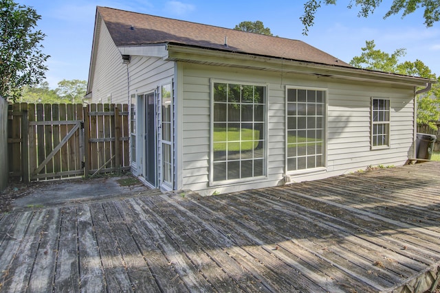 deck with fence and a gate