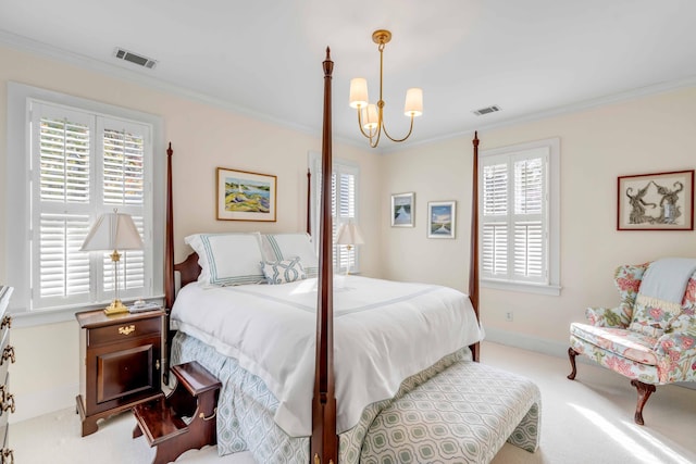 carpeted bedroom with ornamental molding and a notable chandelier