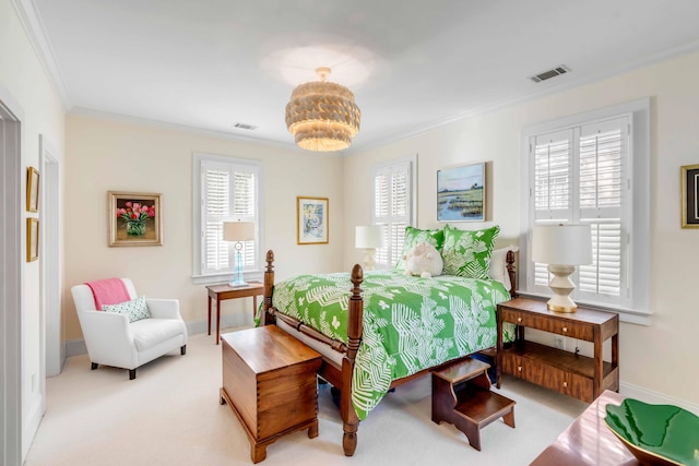 carpeted bedroom with multiple windows and crown molding