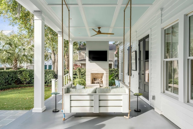 view of patio with a porch and ceiling fan