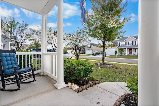 view of patio featuring a porch