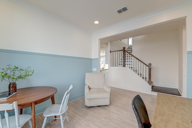 office area featuring visible vents, wood finished floors, recessed lighting, crown molding, and baseboards