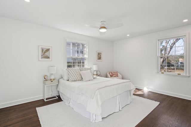 bedroom with recessed lighting, baseboards, dark wood-type flooring, and ceiling fan