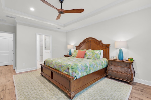 bedroom with ensuite bathroom, ceiling fan, ornamental molding, and light wood-type flooring