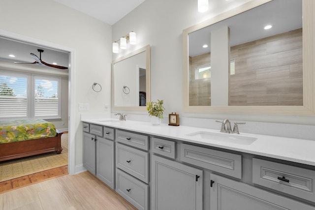 bathroom featuring ceiling fan and vanity