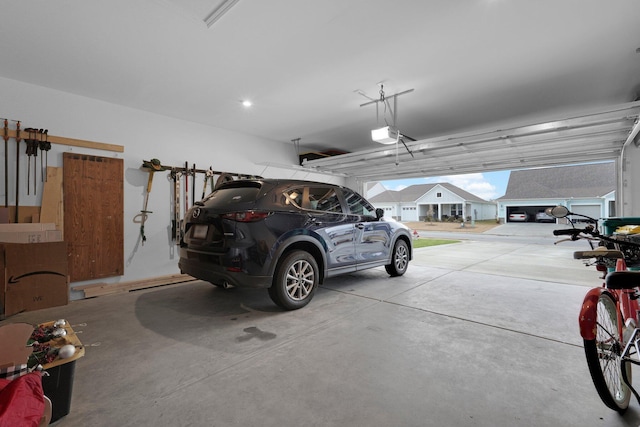 garage featuring a garage door opener