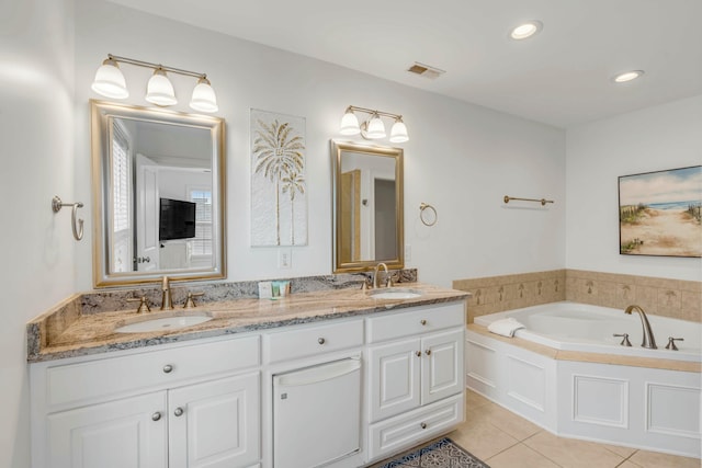 full bath featuring double vanity, visible vents, a sink, and tile patterned floors