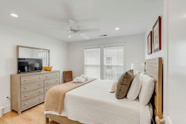 bedroom featuring recessed lighting, visible vents, ceiling fan, and light wood finished floors