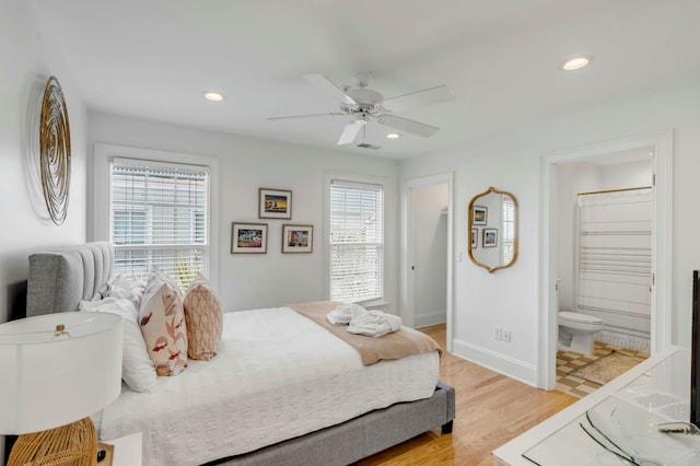 bedroom with light wood-type flooring, ceiling fan, baseboards, and recessed lighting