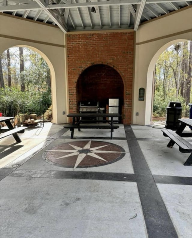 view of patio featuring a grill