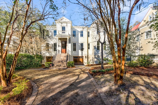 view of front of home with a balcony