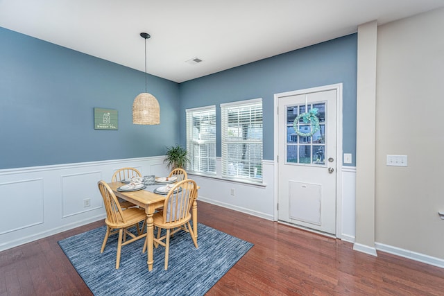 458 Whispering Breeze Ln, Summerville, SC 29486 - dining area featuring visible vents, a wainscoted wall, and wood finished floors