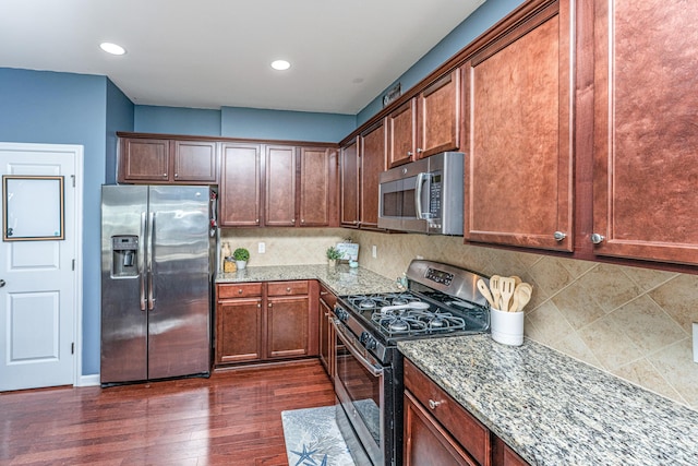 458 Whispering Breeze Ln, Summerville, SC 29486 - kitchen with tasteful backsplash, dark wood-style floors, light stone counters, and stainless steel appliances