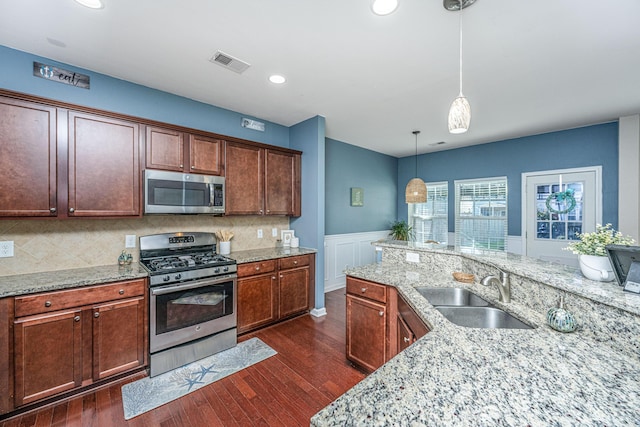 458 Whispering Breeze Ln, Summerville, SC 29486 - kitchen with dark wood-style flooring, a sink, visible vents, and stainless steel appliances