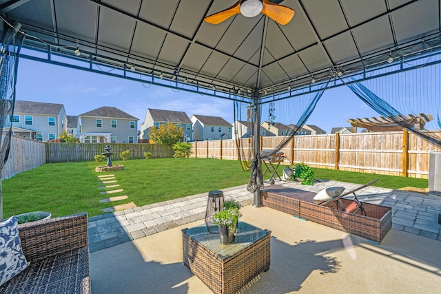 458 Whispering Breeze Ln, Summerville, SC 29486 - view of patio / terrace featuring a ceiling fan, a gazebo, a fenced backyard, and a residential view