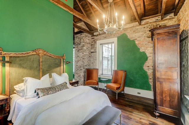 bedroom with wood ceiling, an inviting chandelier, brick wall, dark hardwood / wood-style flooring, and beamed ceiling