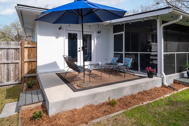 2137 Barbour Dr, Charleston, SC 29414 - view of patio with french doors, a sunroom, and fence