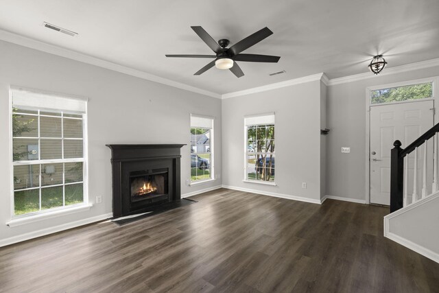 132 E Hartwick Ln, Goose Creek, SC 29445 - unfurnished living room featuring visible vents, stairs, wood finished floors, plenty of natural light, and a fireplace with flush hearth