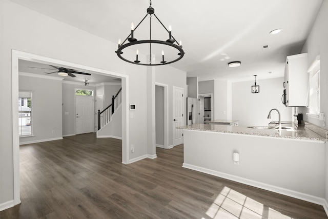 132 E Hartwick Ln, Goose Creek, SC 29445 - kitchen featuring a sink, white cabinets, a peninsula, dark wood-style floors, and stainless steel appliances