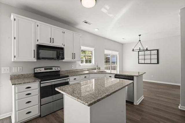 132 E Hartwick Ln, Goose Creek, SC 29445 - kitchen featuring stainless steel appliances, white cabinetry, a sink, and a peninsula