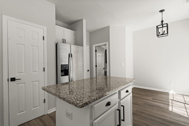 132 E Hartwick Ln, Goose Creek, SC 29445 - kitchen featuring dark wood-style flooring, stainless steel fridge with ice dispenser, baseboards, white cabinets, and an inviting chandelier