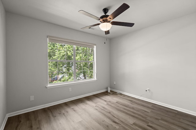 132 E Hartwick Ln, Goose Creek, SC 29445 - empty room with baseboards, ceiling fan, wood finished floors, and visible vents