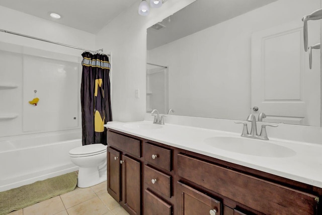 full bathroom featuring tile patterned floors, vanity, toilet, and shower / bath combo with shower curtain