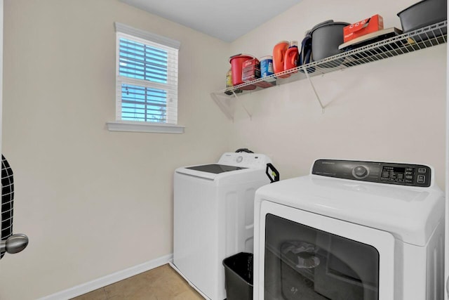 washroom featuring washer and dryer