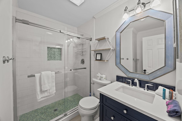 full bathroom with a stall shower, vanity, toilet, and crown molding