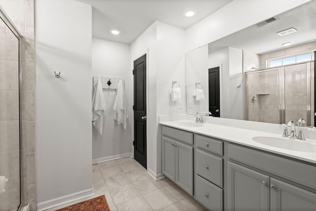 bathroom with vanity and walk in shower