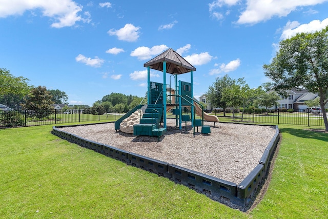 view of play area with a yard