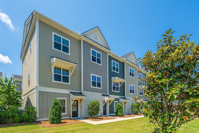 1242 Allusion Ln Unit 206, Mount Pleasant, SC 29466 - multi unit property with board and batten siding and a front yard