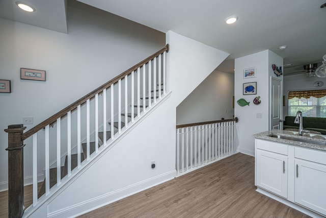 1242 Allusion Ln Unit 206, Mount Pleasant, SC 29466 - stairs featuring wood finished floors, recessed lighting, and baseboards