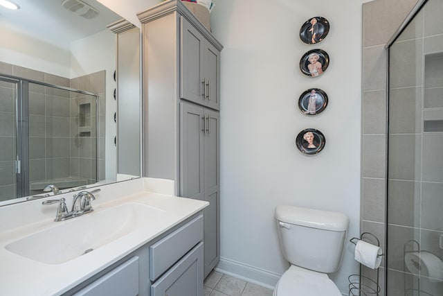 1242 Allusion Ln Unit 206, Mount Pleasant, SC 29466 - full bath with vanity, toilet, a tile shower, tile patterned flooring, and baseboards