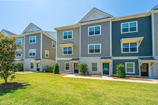 1242 Allusion Ln Unit 206, Mount Pleasant, SC 29466 - townhome / multi-family property with board and batten siding and a front yard