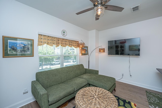 1242 Allusion Ln Unit 206, Mount Pleasant, SC 29466 - living area featuring a ceiling fan, wood finished floors, and baseboards