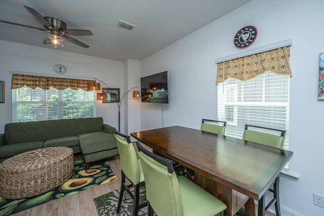 1242 Allusion Ln Unit 206, Mount Pleasant, SC 29466 - dining area featuring wood finished floors and a ceiling fan