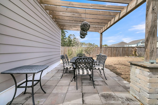 view of patio / terrace with a fenced backyard, outdoor dining area, and a pergola