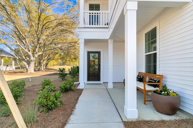 property entrance with a balcony