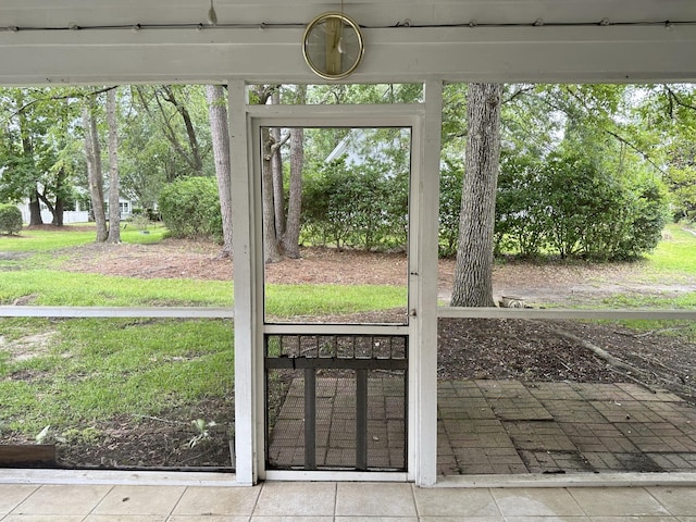 unfurnished sunroom with a wealth of natural light