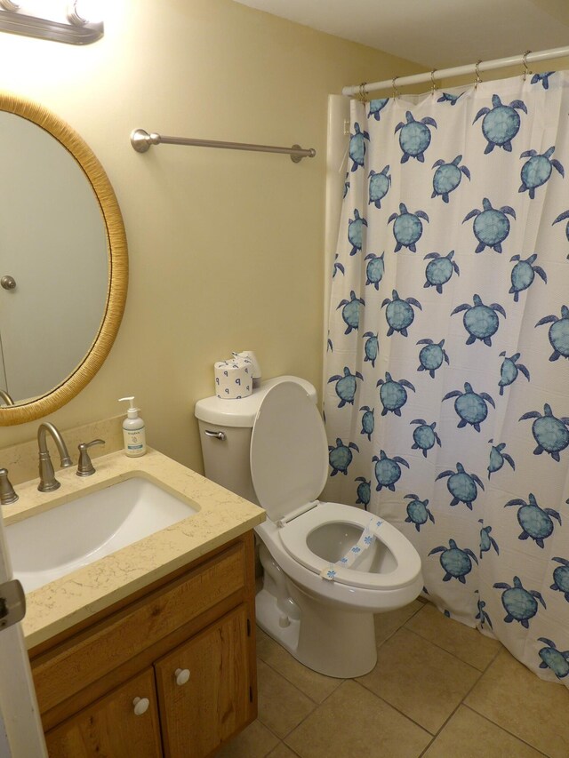 237 Driftwood Ln, Edisto Island, SC 29438 - full bathroom featuring toilet, curtained shower, tile patterned flooring, and vanity