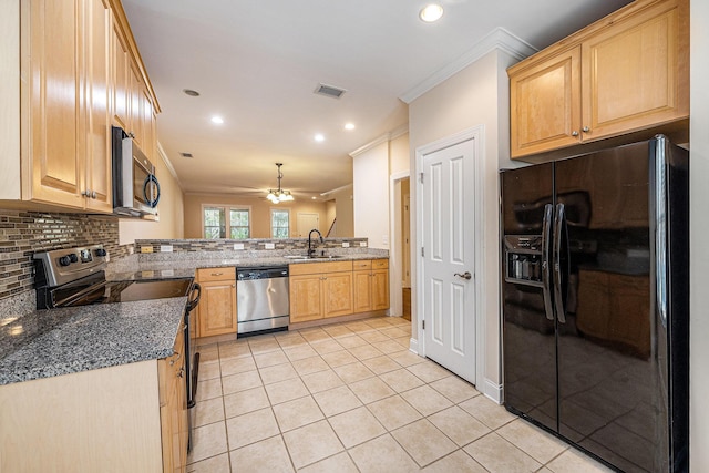 kitchen with appliances with stainless steel finishes, ceiling fan, a sink, visible vents, and light tile patterned flooring