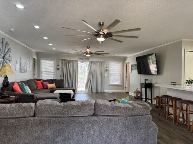 1188 Blackberry Bush Rd, Summerton, SC 29148 - living area featuring ceiling fan, a textured ceiling, dark wood finished floors, ornamental molding, and recessed lighting