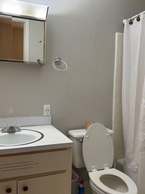 1188 Blackberry Bush Rd, Summerton, SC 29148 - bathroom with toilet, shower / bathtub combination with curtain, and vanity