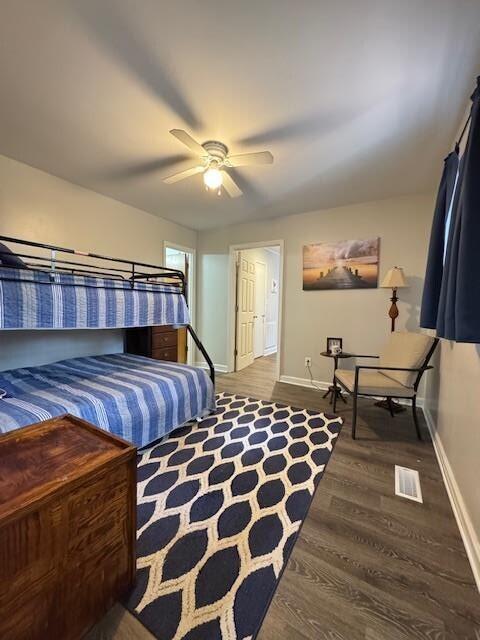 1188 Blackberry Bush Rd, Summerton, SC 29148 - bedroom with baseboards, ceiling fan, wood finished floors, and visible vents