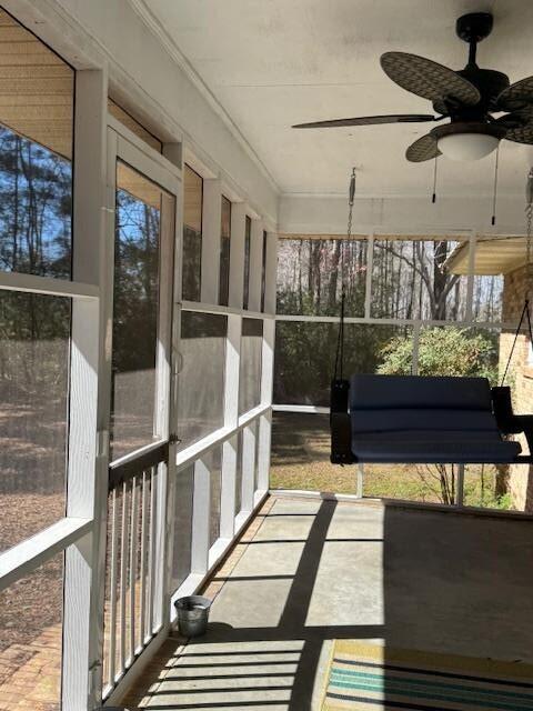 1188 Blackberry Bush Rd, Summerton, SC 29148 - unfurnished sunroom with plenty of natural light and ceiling fan