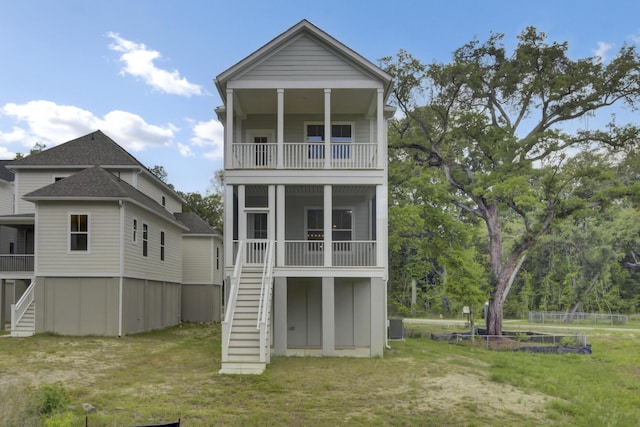 3029 Robeson Trce, Johns Island, SC 29455 - back of house with stairs, a balcony, a sunroom, and central air condition unit