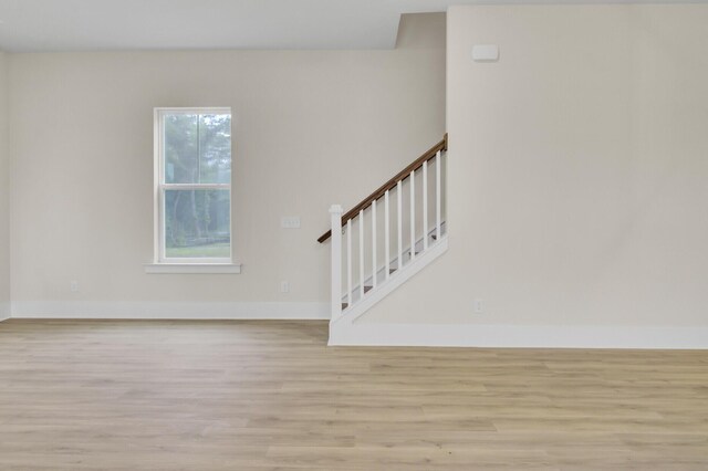 3029 Robeson Trce, Johns Island, SC 29455 - entryway featuring light wood-style floors, baseboards, and stairs