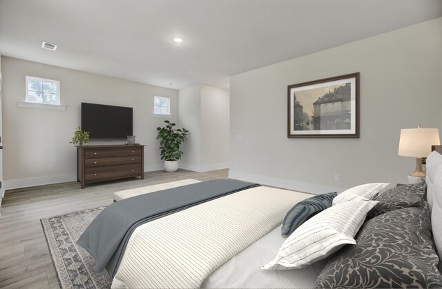 3029 Robeson Trce, Johns Island, SC 29455 - bedroom with multiple windows, light wood-type flooring, baseboards, and recessed lighting